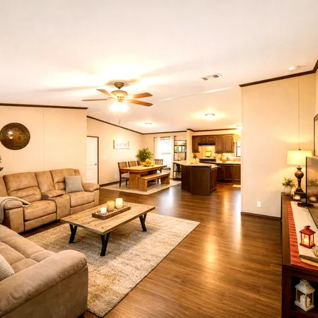 a living room with furniture and a view of kitchen