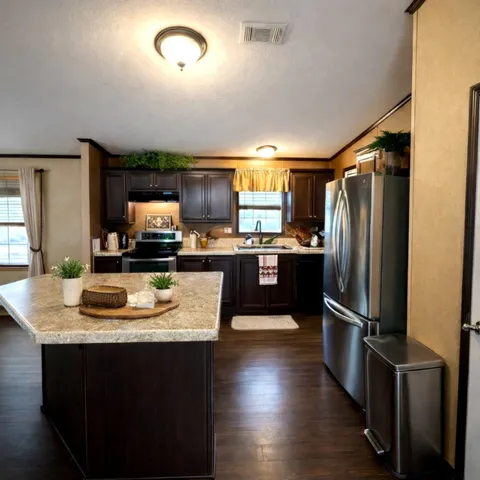 a kitchen with a sink stove and refrigerator