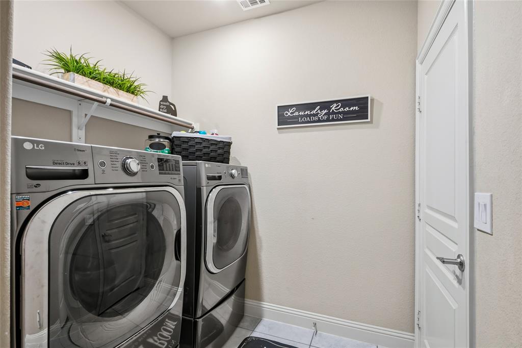 1802 Roundtree Road Forney, TX 75126 - Photo 27 of 39 a utility room with dryer and washer