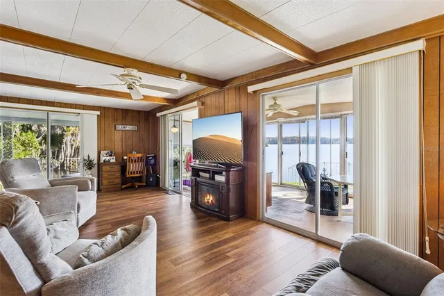 a living room with furniture and a window