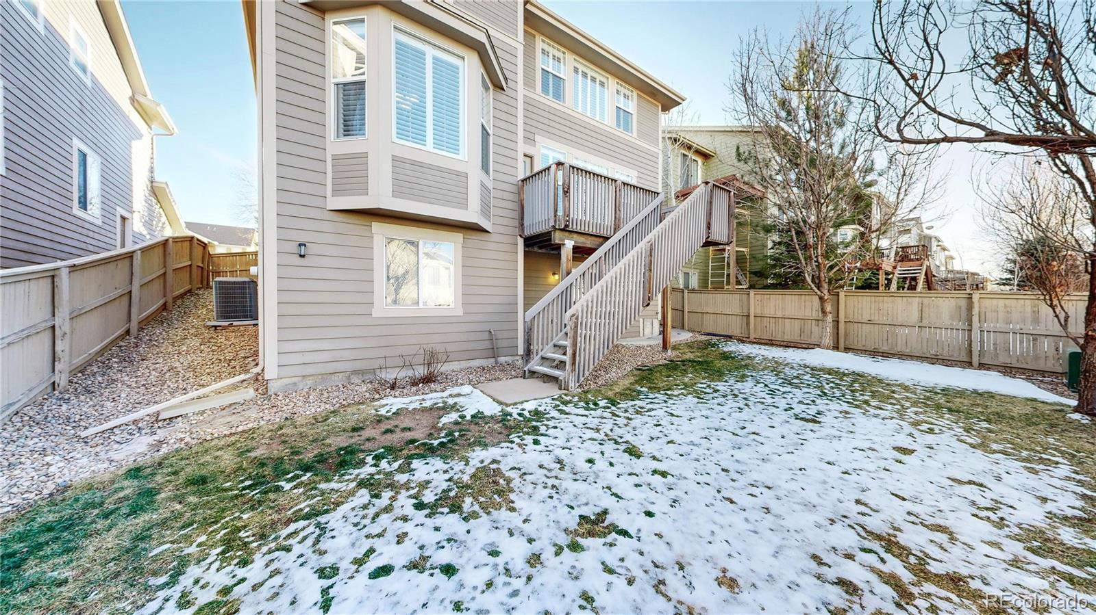 10797 Hickory Ridge Street Highlands Ranch, CO 80126 - Photo 34 of 42 a backyard of a house