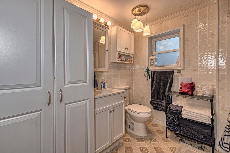 615 West 4th Avenue Derry, PA 15627 - Photo 11 of 28 a bathroom with a sink toilet vanity and shower