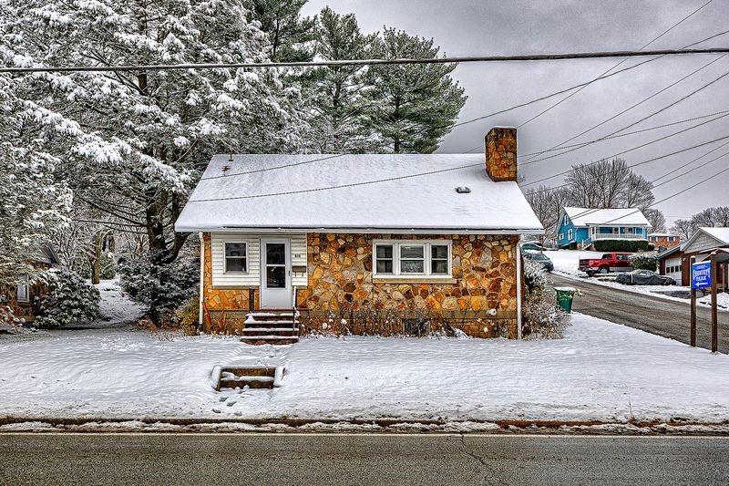 615 West 4th Avenue Derry, PA 15627 - Photo 2 of 28 a front view of a house with a yard