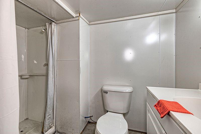 615 West 4th Avenue Derry, PA 15627 - Photo 22 of 28 a bathroom with a toilet and a shower