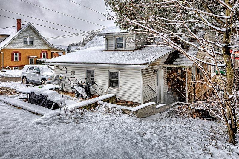 615 West 4th Avenue Derry, PA 15627 - Photo 25 of 28 a front view of a house with garage