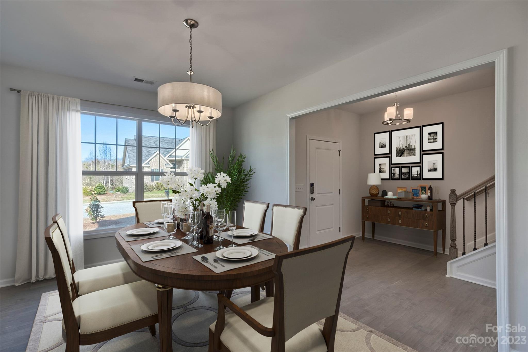 745 Sawgrass Rdg Court Rock Hill, SC 29732 - Photo 4 of 19 a view of a dining room with furniture window and wooden floor