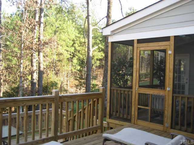 1132 Coram Fields Road Wake Forest, NC 27587 - Photo 10 of 10 Another view of this glamorous set of double decks, screened porch and view of the forest! All that's missing is a Hot Tub! It's so private 'no clothes required'