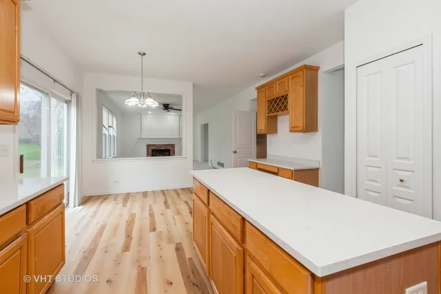 a view of a kitchen cabinets and wooden floor