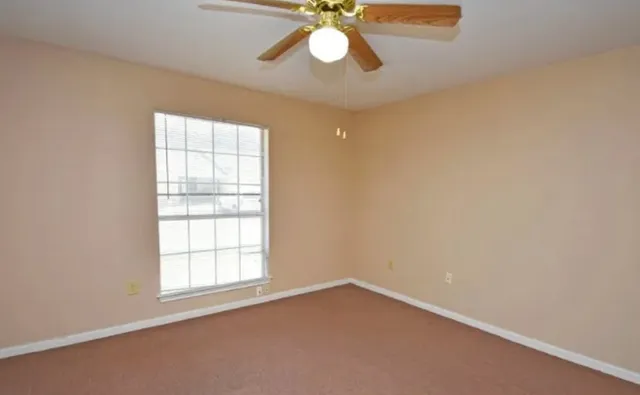 an empty room with a window