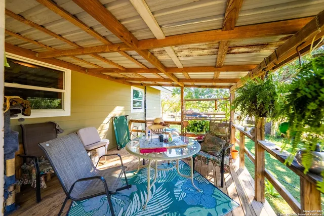 a view of a outdoor space with trees in the background