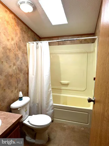 a view of a door with wooden floor