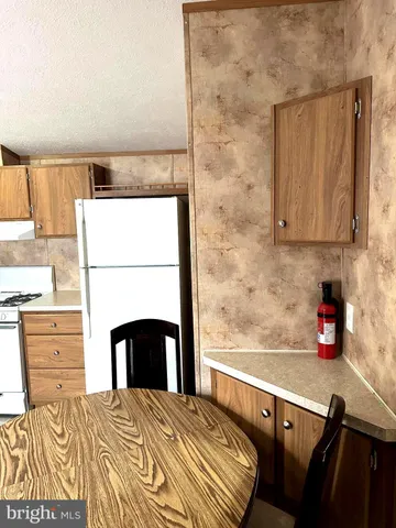 a bedroom with a bed and dresser