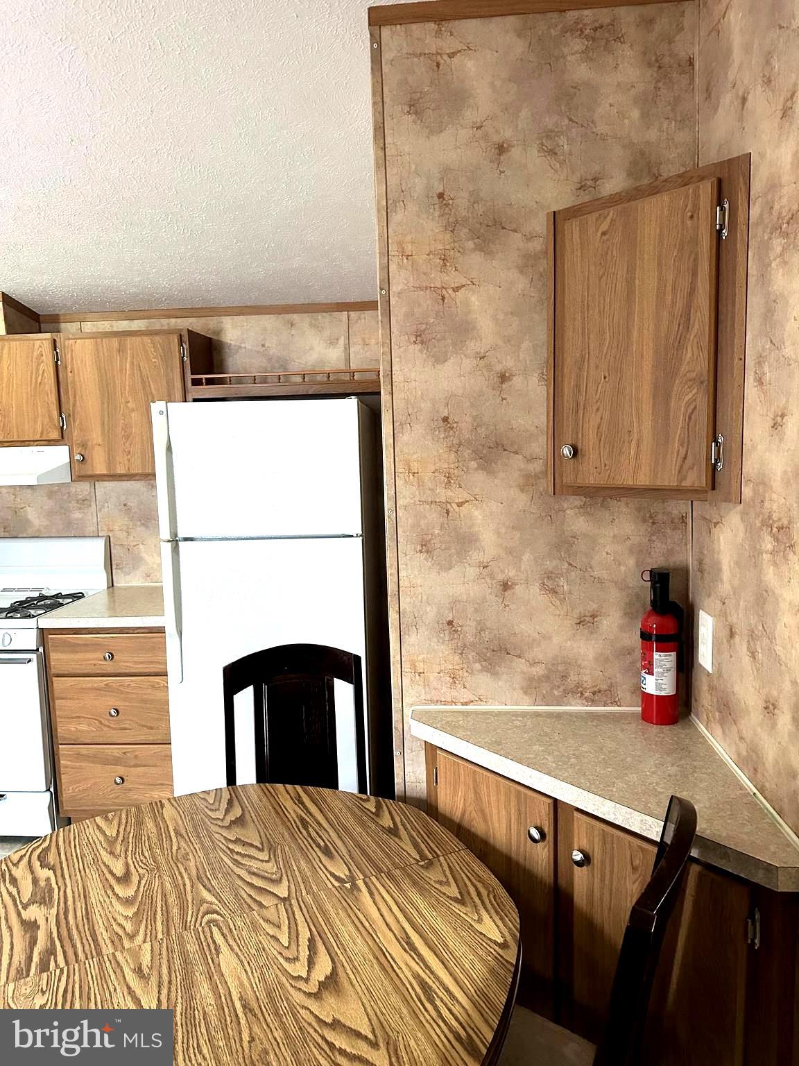 472 South Lancaster Street, Unit 8 Lebanon, PA 17046 - Photo 6 of 17 a bedroom with a bed and dresser