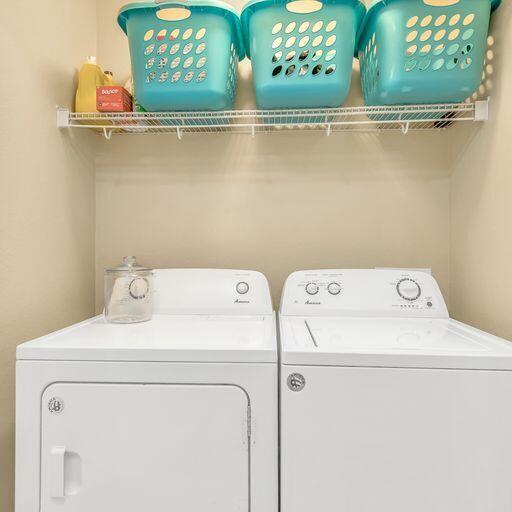 24 South Sand Palm Road, Unit 48 Freeport, FL 32439 - Photo 16 of 27 a utility room with dryer and washer