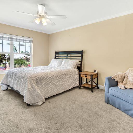 24 South Sand Palm Road, Unit 48 Freeport, FL 32439 - Photo 18 of 27 a bedroom with a bed and a couch