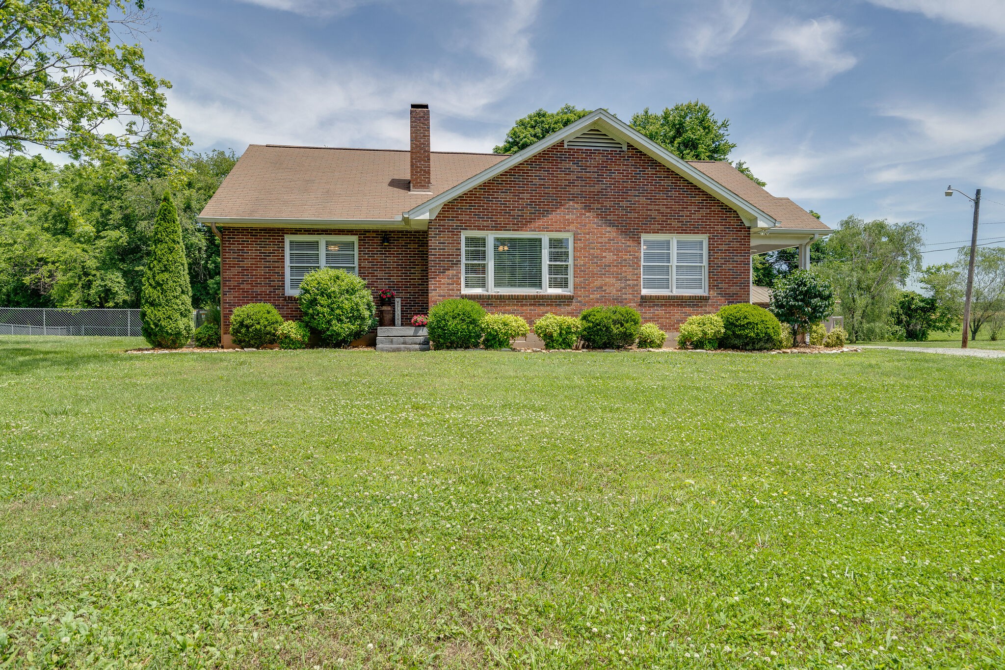 2241 Battle Creek Road Springfield, TN 37172 - Photo 2 of 32 a front view of a house with a yard