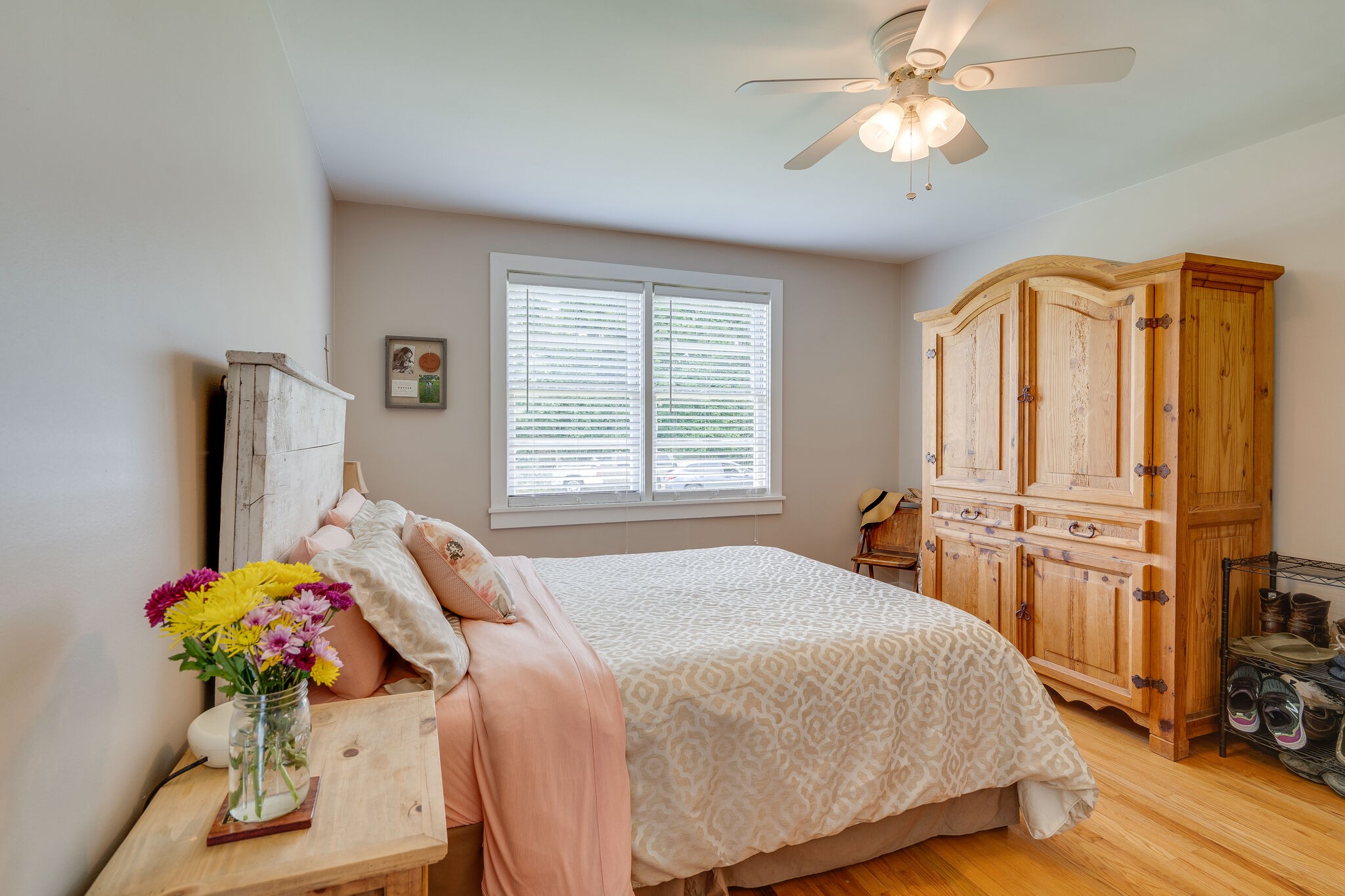 2241 Battle Creek Road Springfield, TN 37172 - Photo 12 of 32 a bedroom with a bed and a potted plant