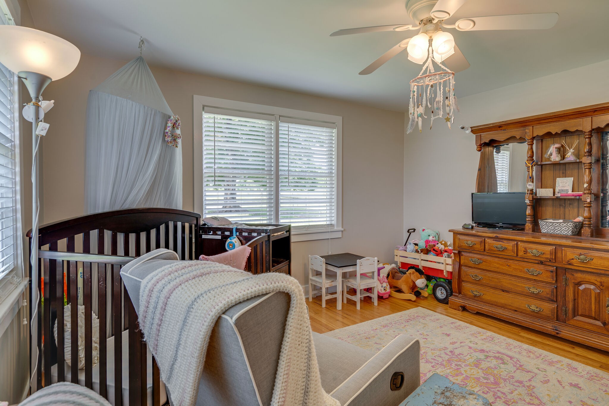2241 Battle Creek Road Springfield, TN 37172 - Photo 21 of 32 a bedroom with furniture and a bed