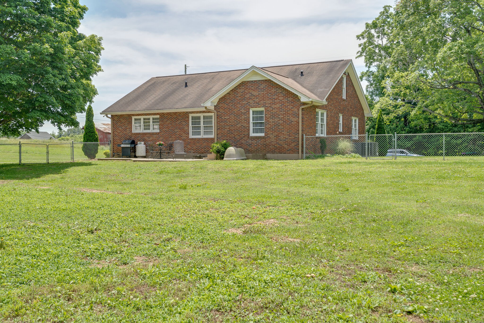 2241 Battle Creek Road Springfield, TN 37172 - Photo 29 of 32 a view of a yard in front of a house with large trees