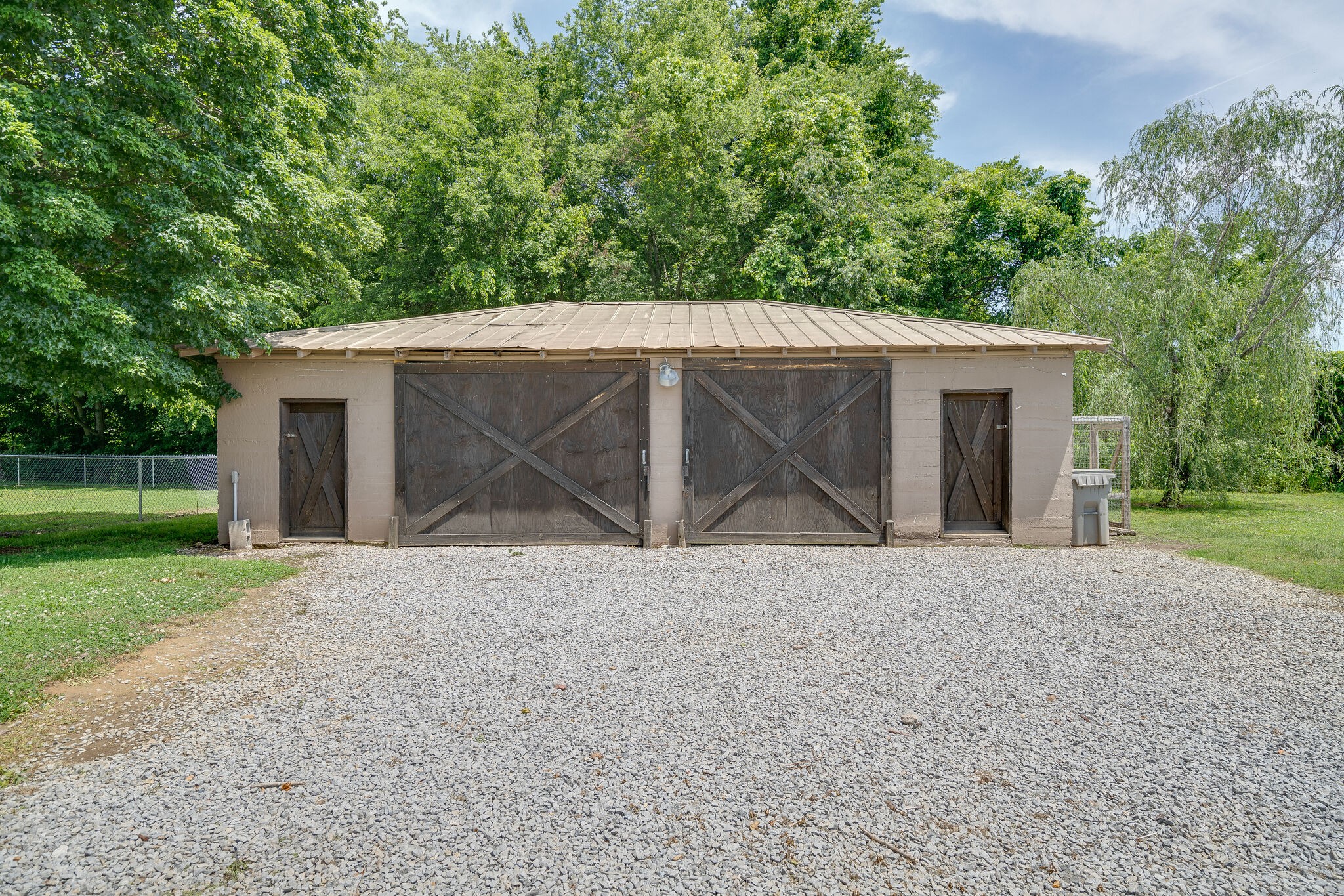 2241 Battle Creek Road Springfield, TN 37172 - Photo 31 of 32 front view of a house with a yard and a garage