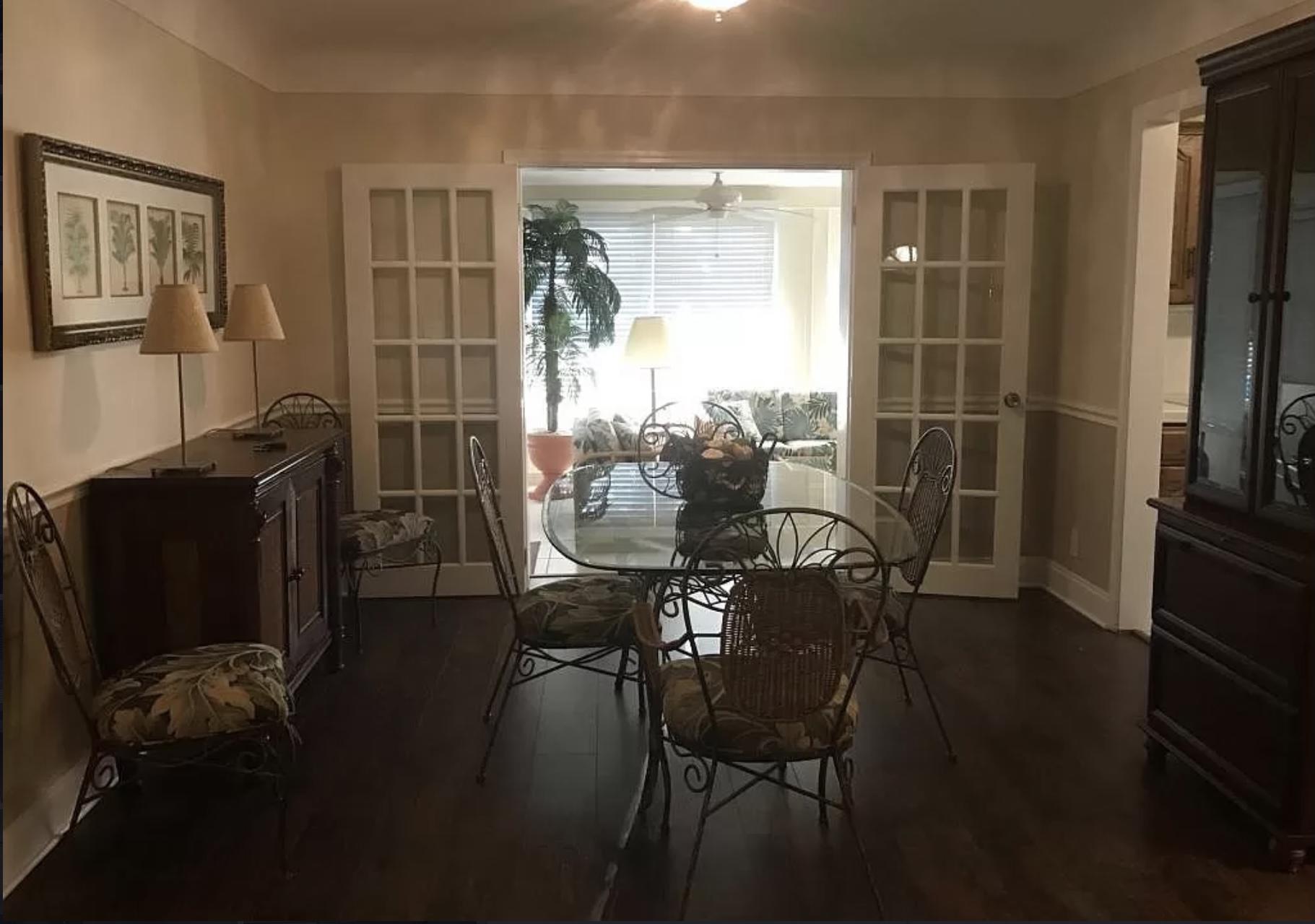 27 Pinehurst Lane Boca Raton, FL 33431 - Photo 2 of 12 a dining room with furniture and a window