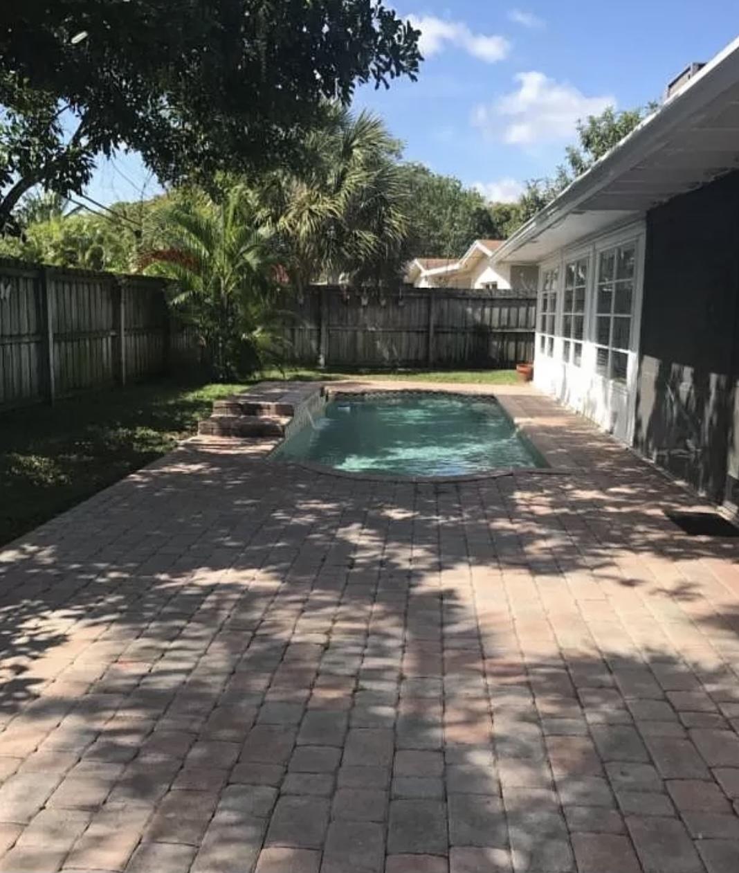 27 Pinehurst Lane Boca Raton, FL 33431 - Photo 12 of 12 a view of backyard of house with green space