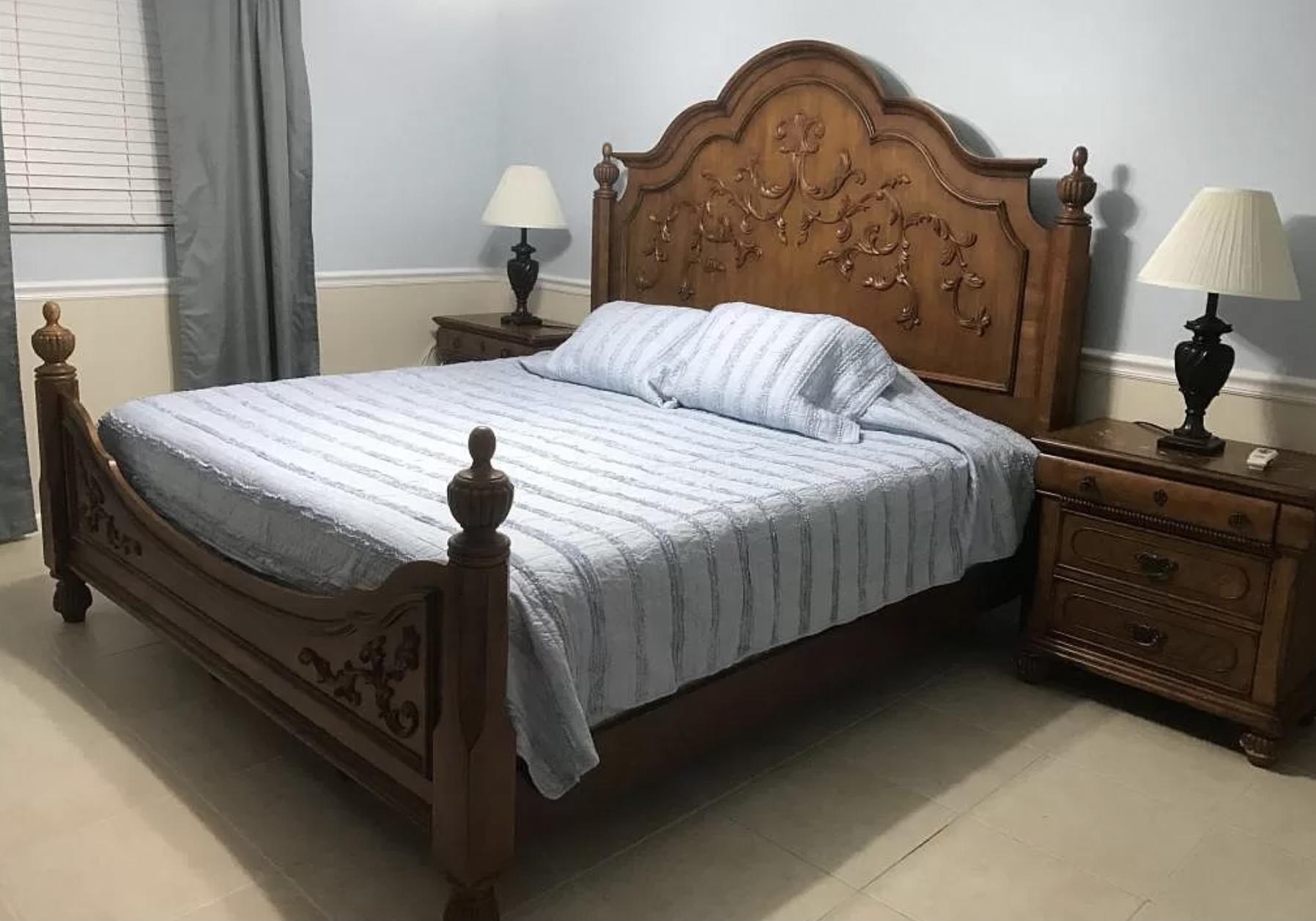 27 Pinehurst Lane Boca Raton, FL 33431 - Photo 6 of 12 a bedroom with a bed and a dresser