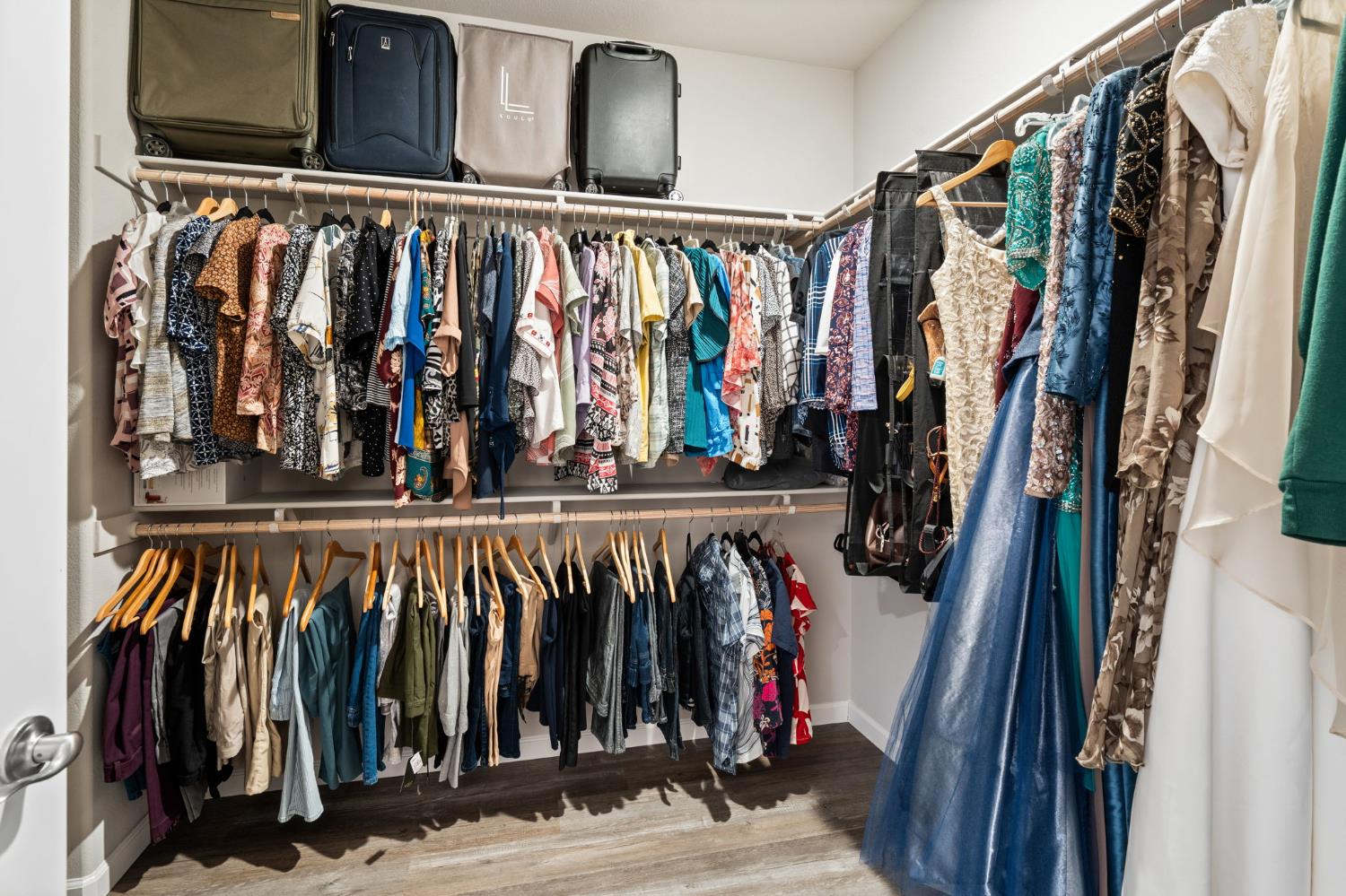948 Hogan Road Galt, CA 95632 - Photo 13 of 20 a view of walk in closet with clothes