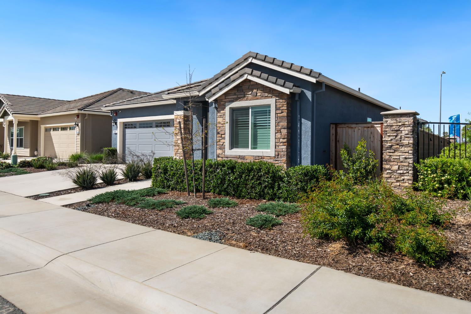948 Hogan Road Galt, CA 95632 - Photo 2 of 20 a front view of a house with a yard