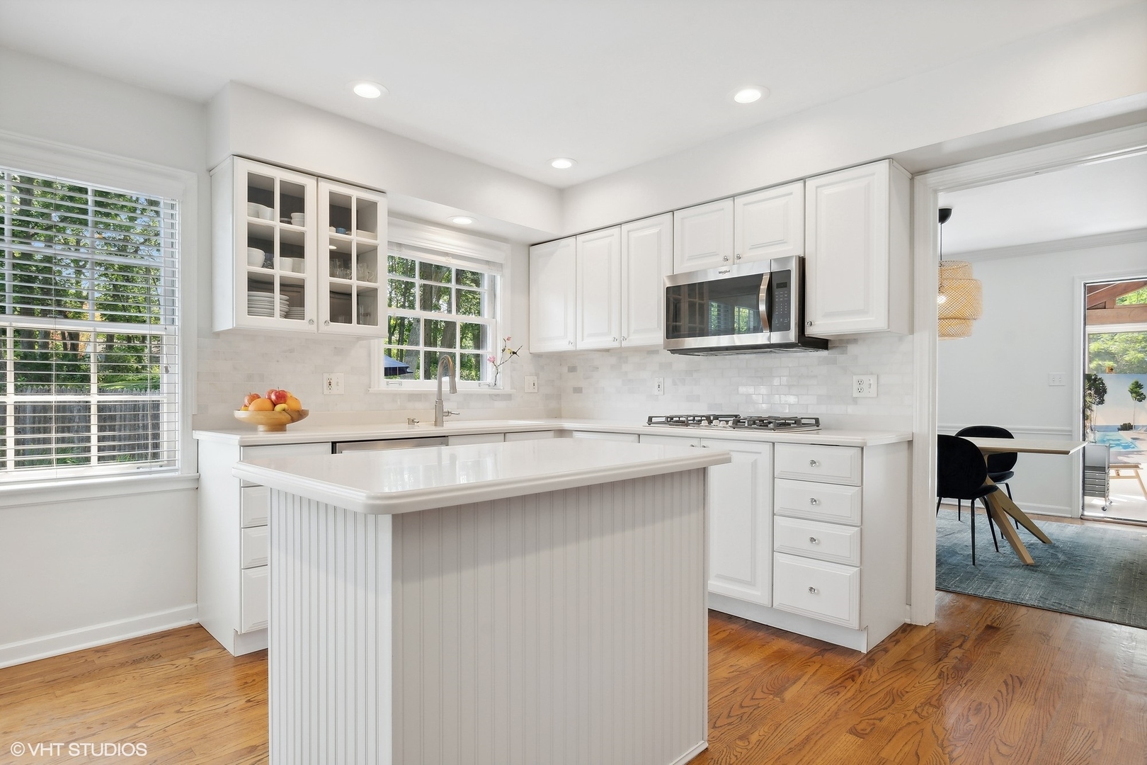 845 Forest Hill Road Lake Forest, IL 60045 - Photo 11 of 41 a kitchen with stainless steel appliances granite countertop a stove a sink and a microwave