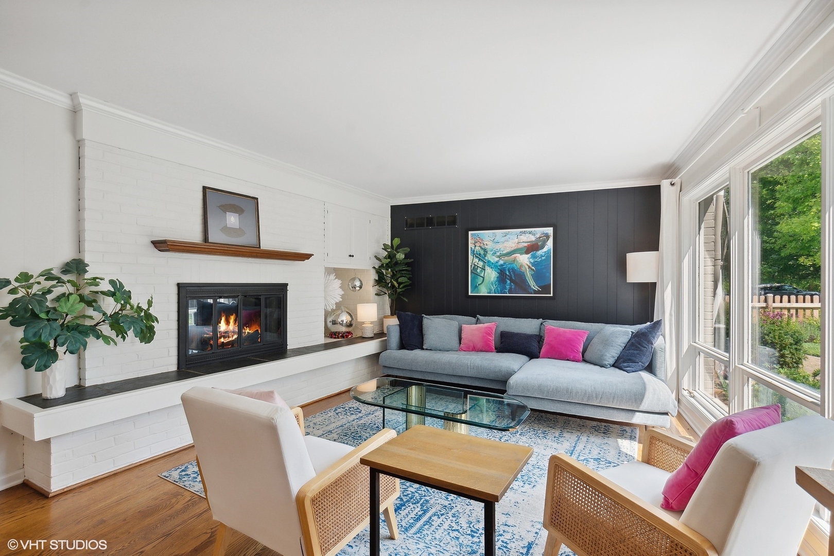 845 Forest Hill Road Lake Forest, IL 60045 - Photo 16 of 41 a living room with furniture and a fireplace