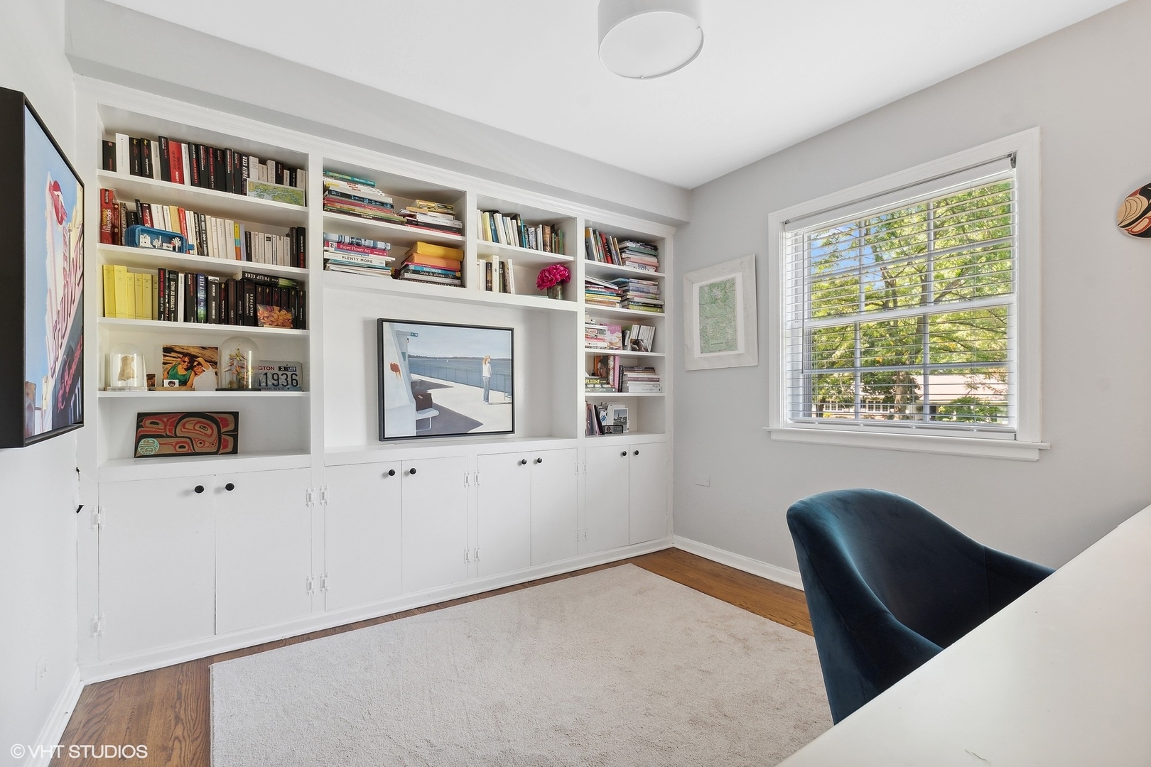 845 Forest Hill Road Lake Forest, IL 60045 - Photo 21 of 41 a living room with hard wood floors and a window