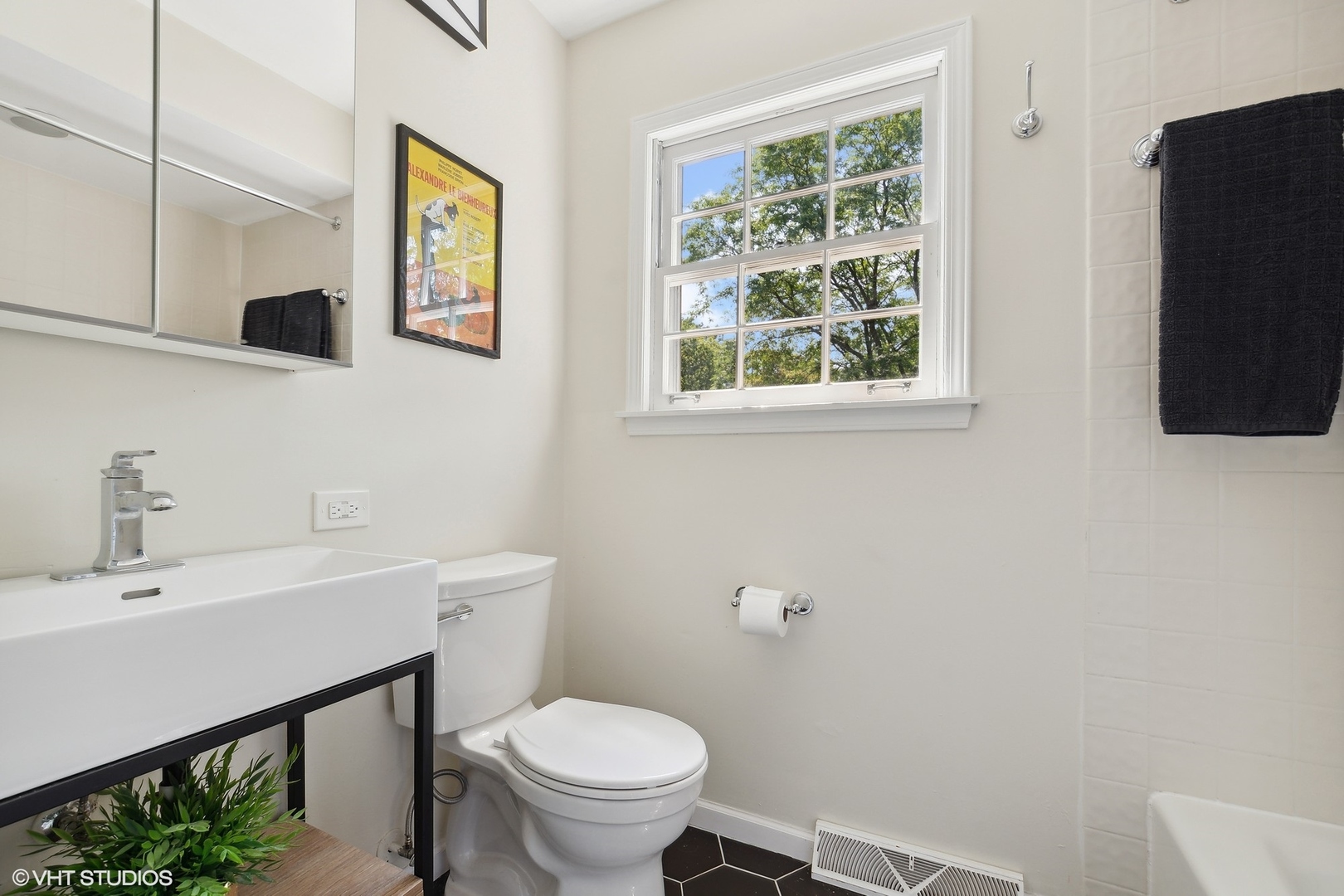 845 Forest Hill Road Lake Forest, IL 60045 - Photo 26 of 41 a bathroom with a sink mirror and toilet