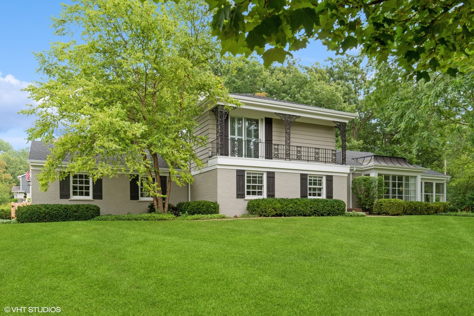 845 Forest Hill Road Lake Forest, IL 60045 - Photo 30 of 41 a front view of a house with a garden