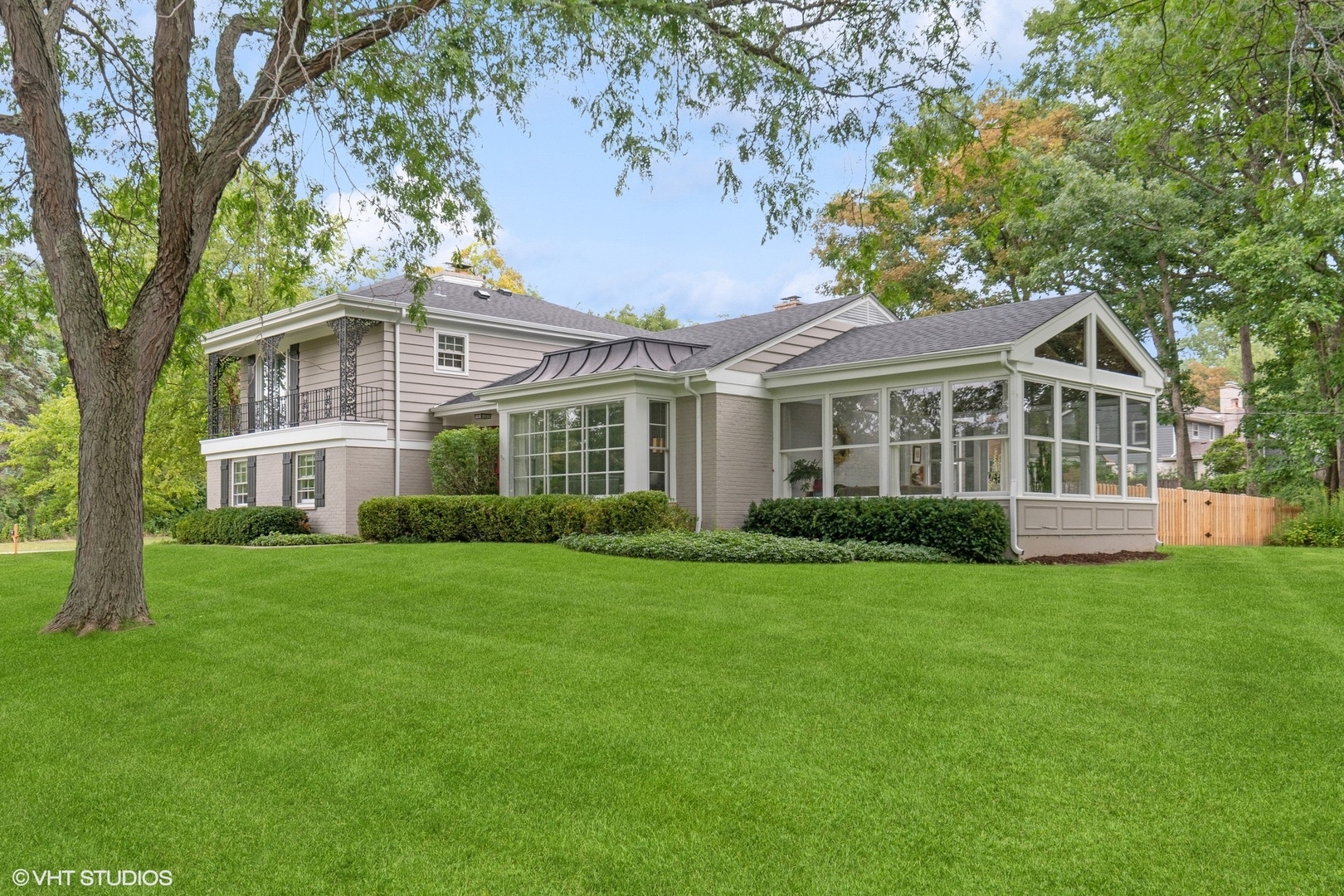 845 Forest Hill Road Lake Forest, IL 60045 - Photo 31 of 41 a front view of a house with a garden