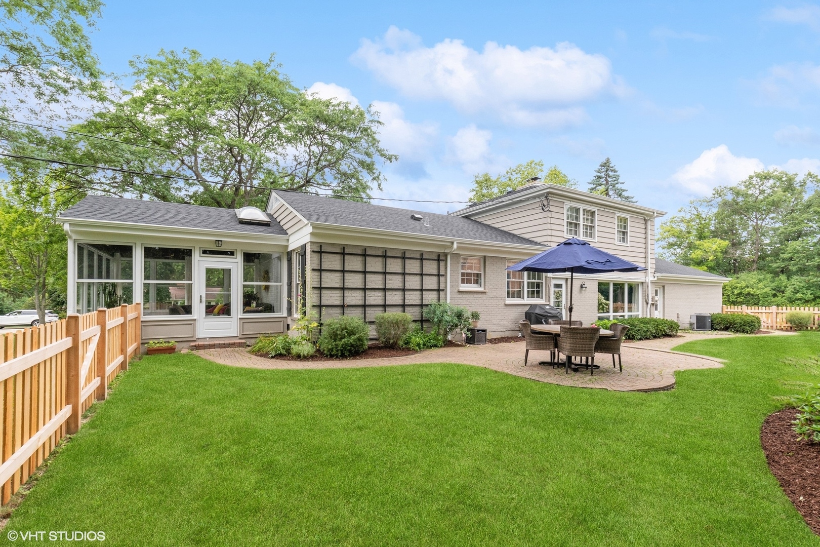 845 Forest Hill Road Lake Forest, IL 60045 - Photo 34 of 41 a view of a house with a yard and sitting area