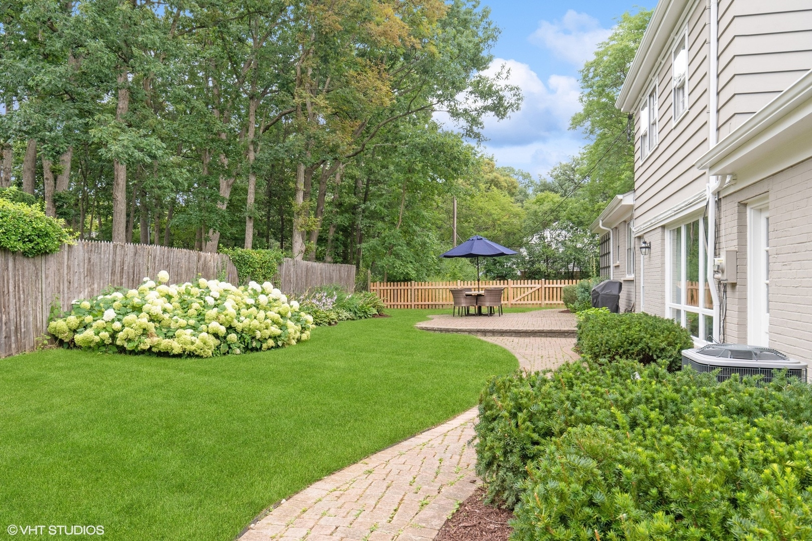 845 Forest Hill Road Lake Forest, IL 60045 - Photo 37 of 41 a view of a garden with potted plants