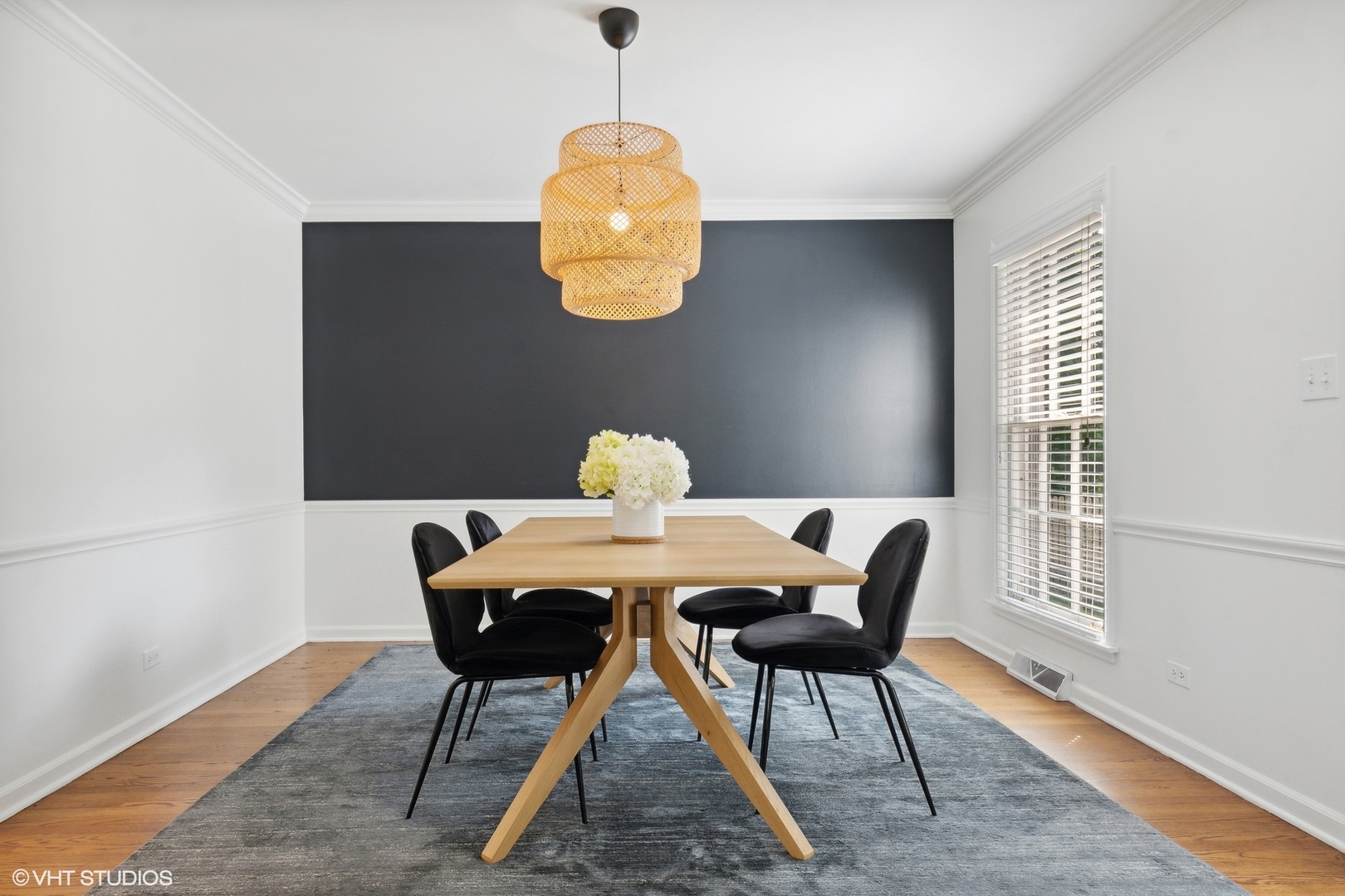 845 Forest Hill Road Lake Forest, IL 60045 - Photo 6 of 41 a view of a dining room with furniture wooden floor and chandelier