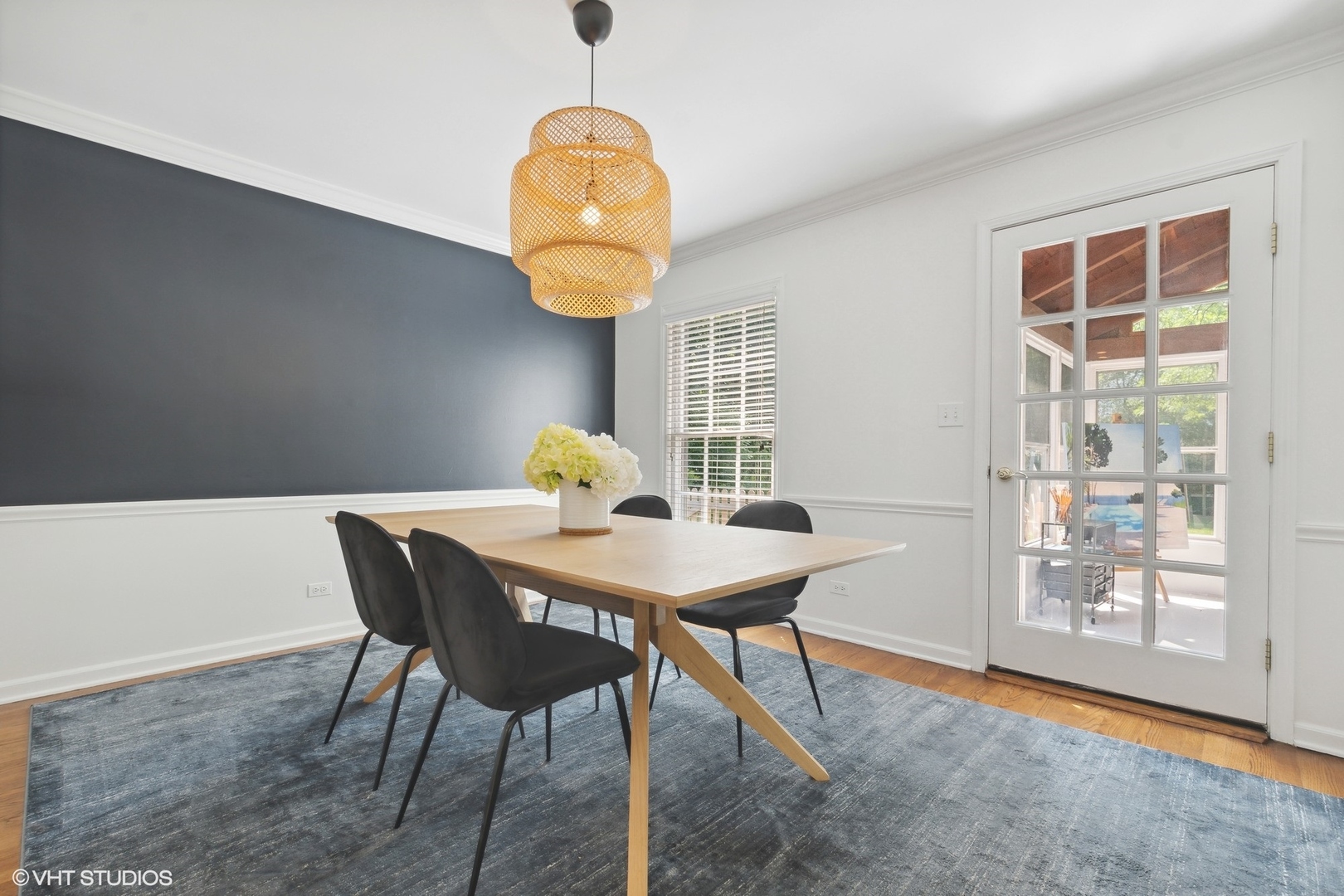 845 Forest Hill Road Lake Forest, IL 60045 - Photo 7 of 41 a view of a dining room with furniture and chandelier