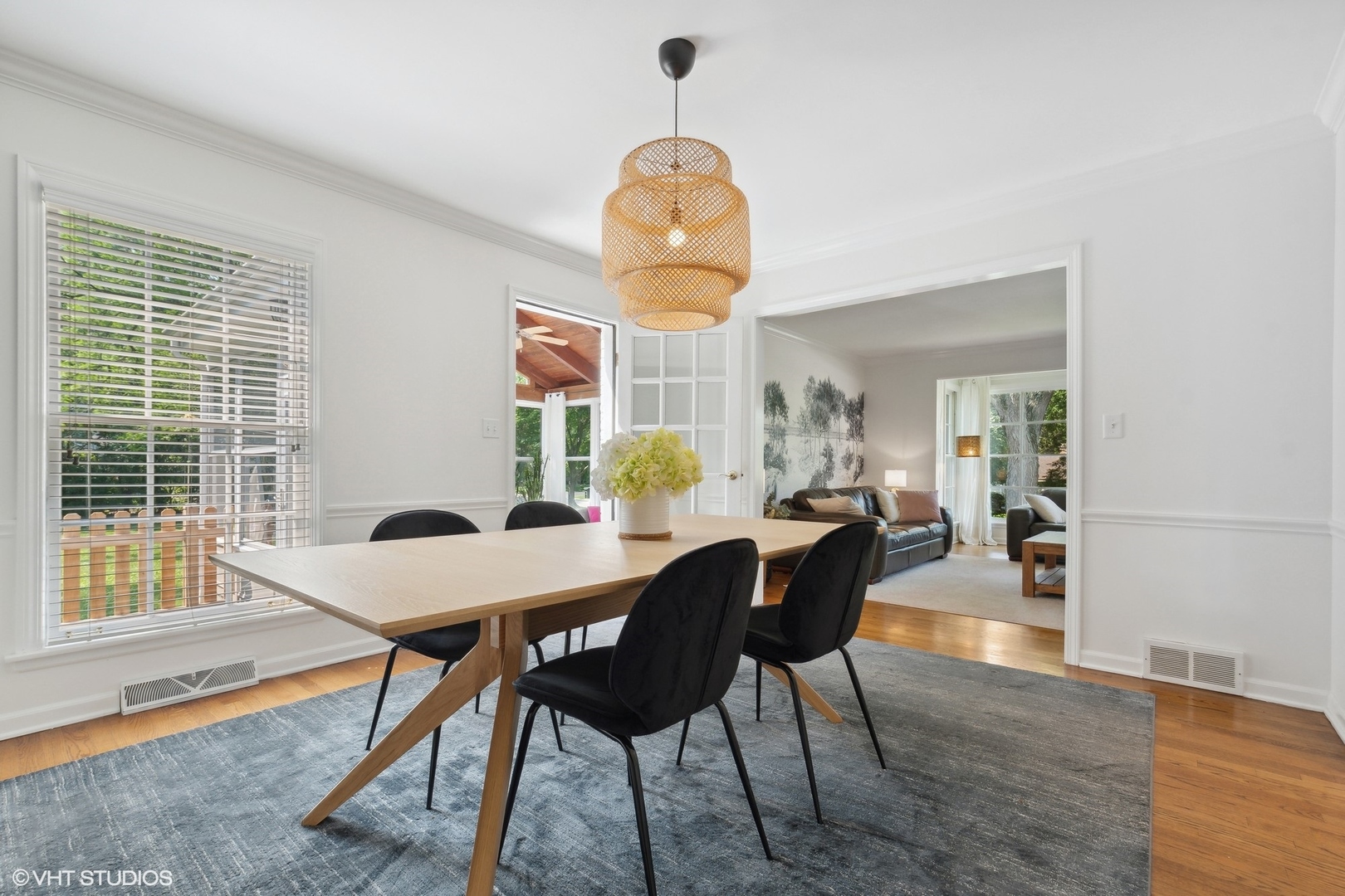 845 Forest Hill Road Lake Forest, IL 60045 - Photo 8 of 41 a view of a dining room with furniture and wooden floor