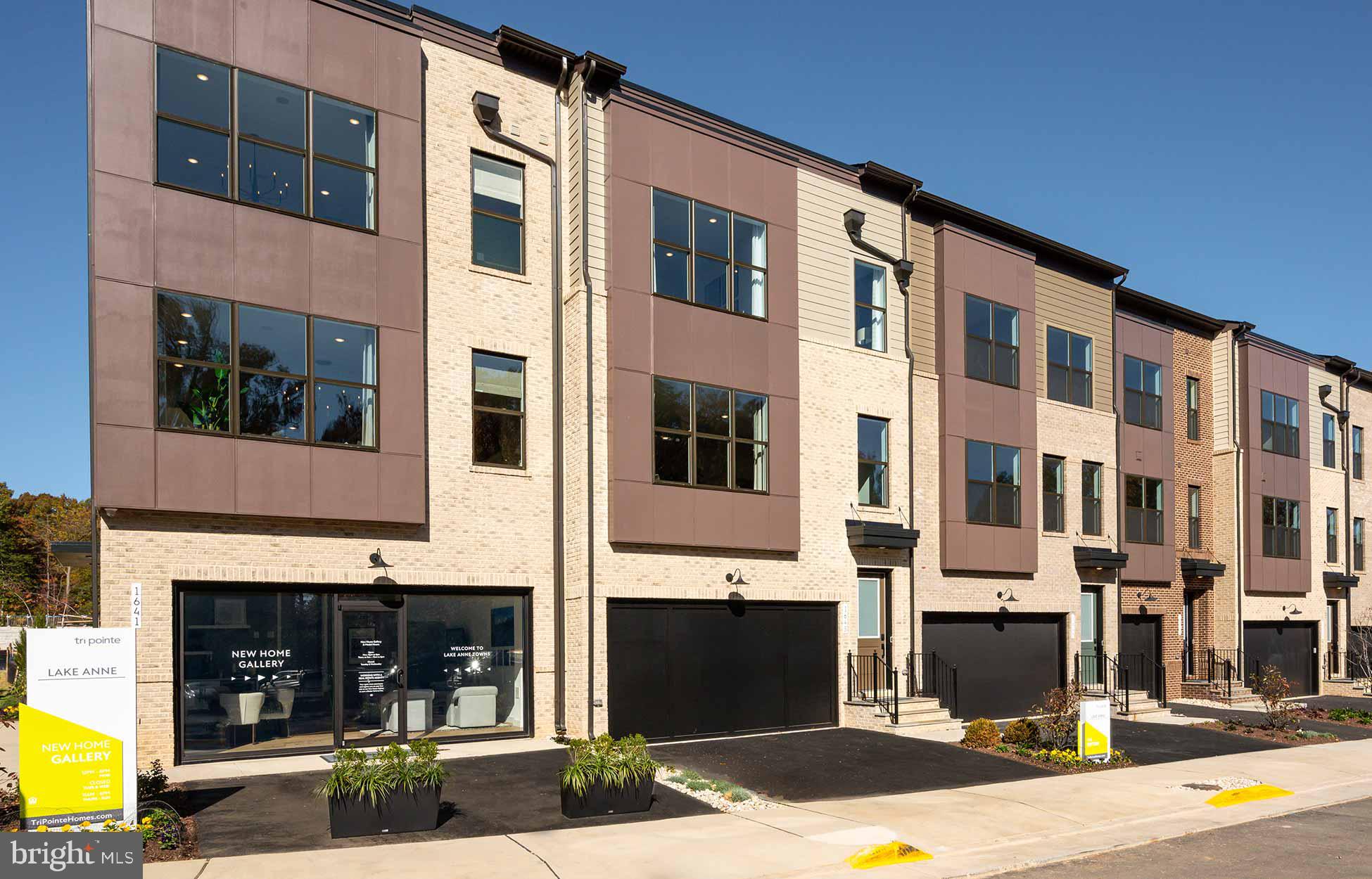 1624 Fellowship Square Reston, VA 20190 - Photo 1 of 18 a front view of a building with street