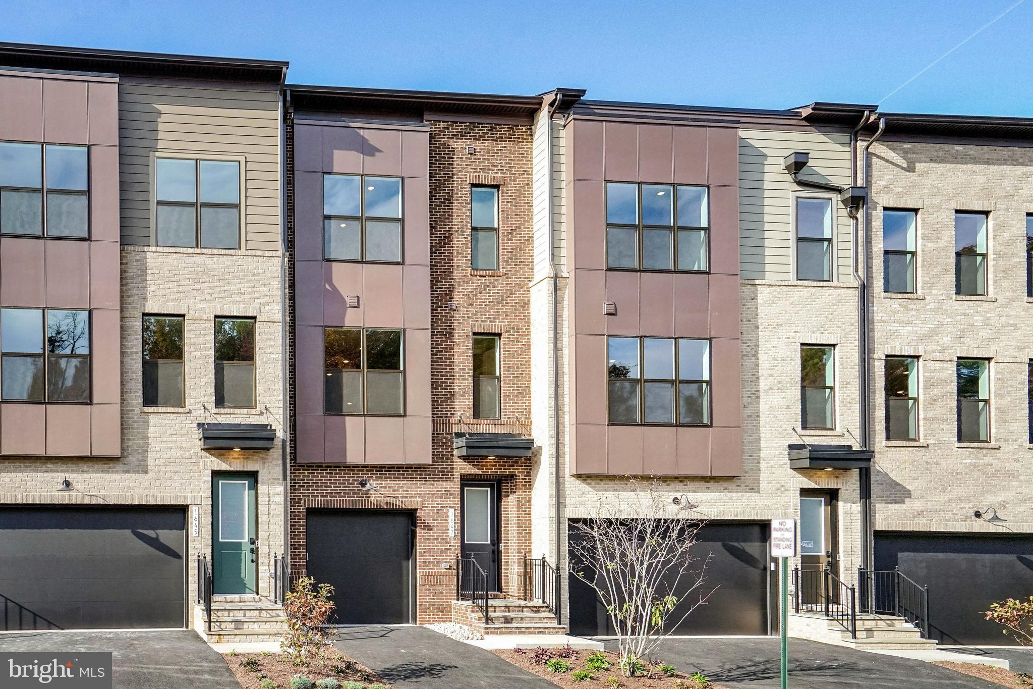 1624 Fellowship Square Reston, VA 20190 - Photo 17 of 18 a front view of a building with a street