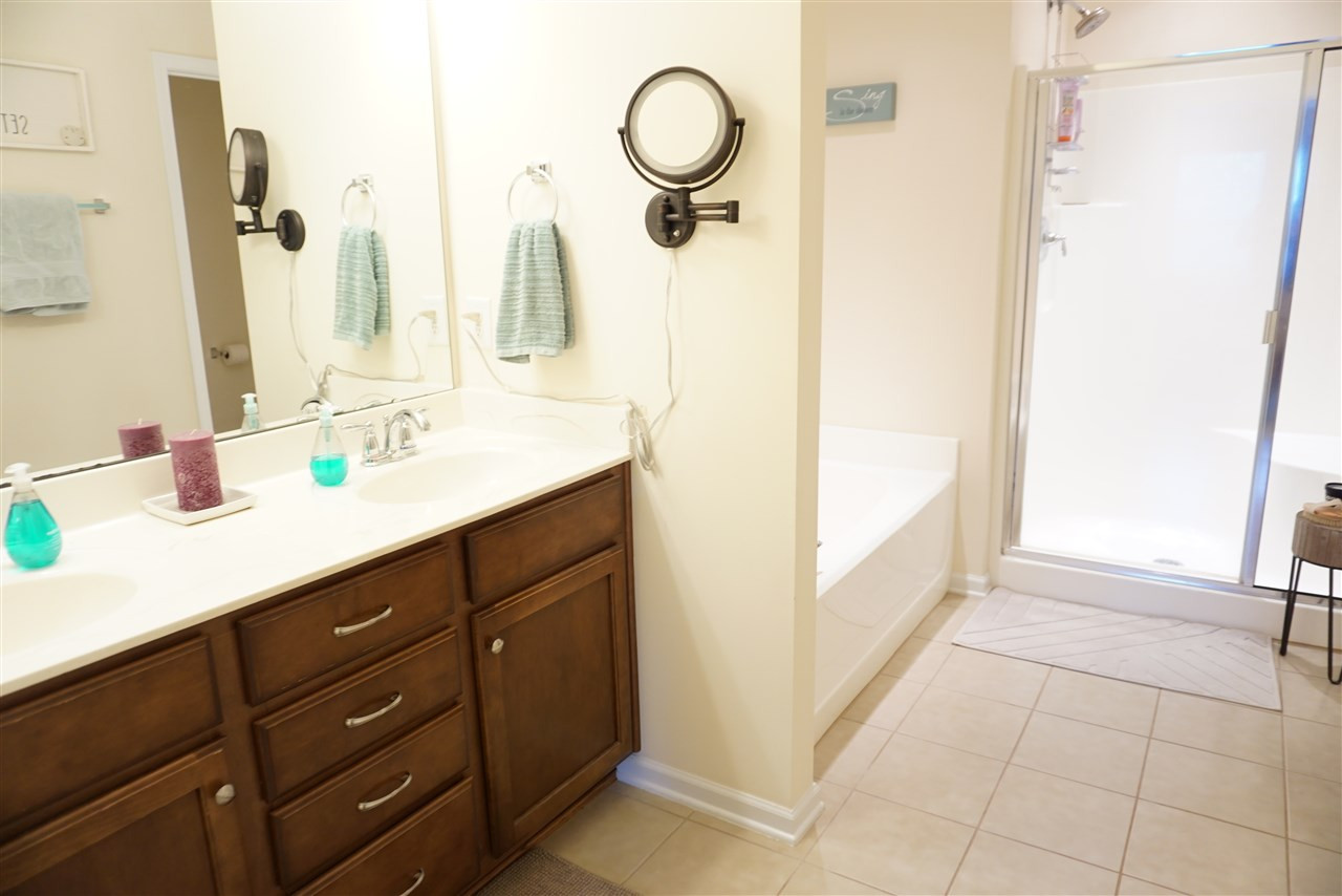 2411 Memory Ridge Drive Raleigh, NC 27606 - Photo 14 of 25 Master bath with dual vanity, garden tub, separate shower. Upgraded tile floor.