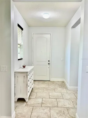 a bathroom with a sink a mirror and a shower