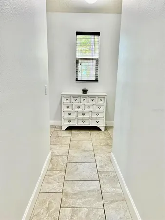 a view of a hallway with entryway