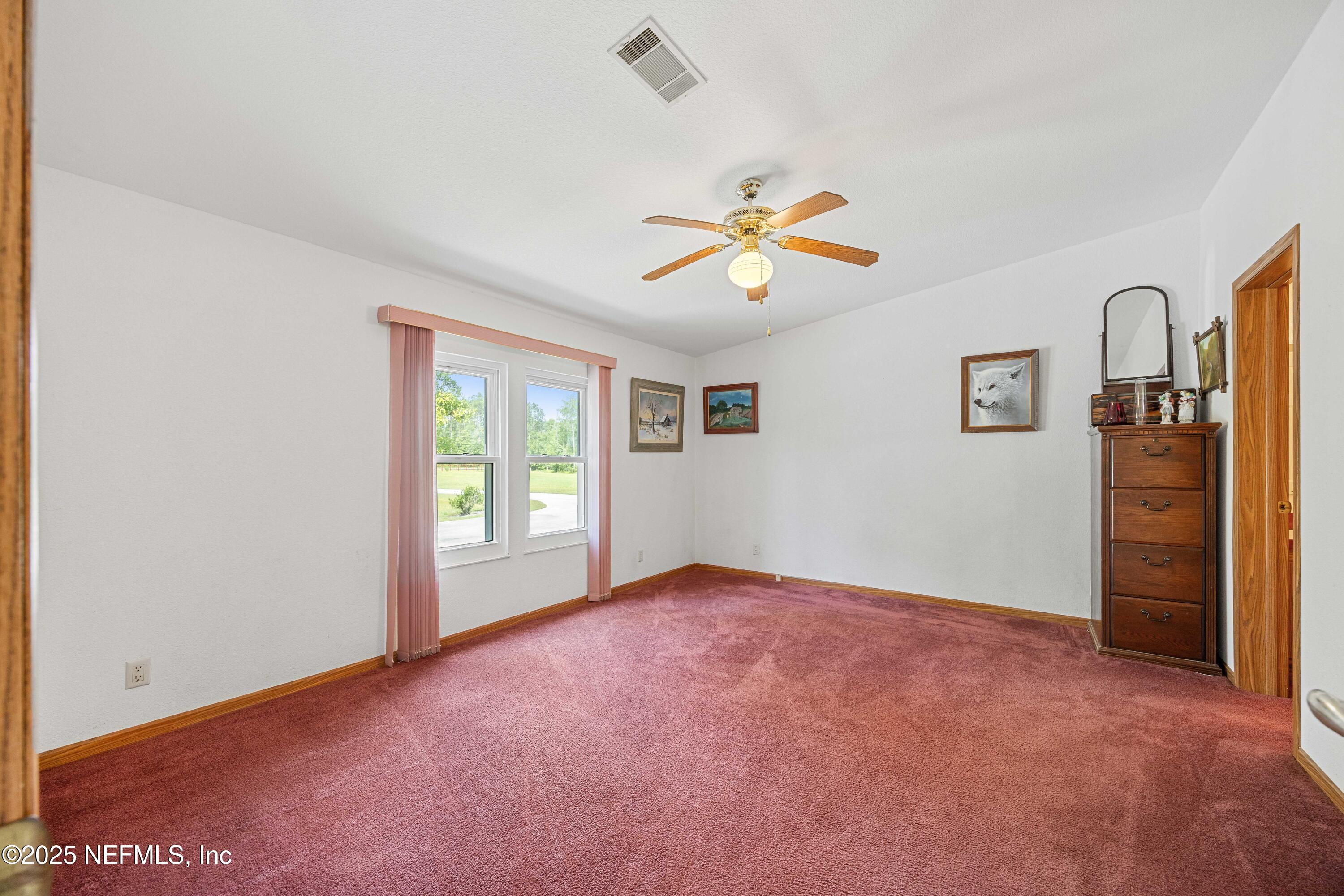 14888 Northeast 148th Path Raiford, FL 32083 - Photo 37 of 61 Primary Bedroom 1