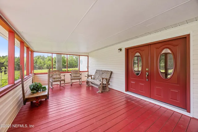a view of a ocean with a building in the background
