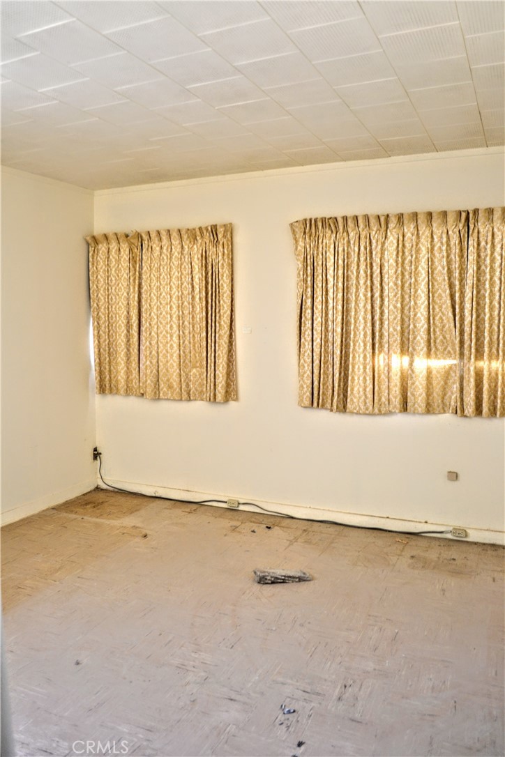 4040 Peter Rabbit Trail Twentynine Palms, CA 92277 - Photo 13 of 28 an empty room with a window