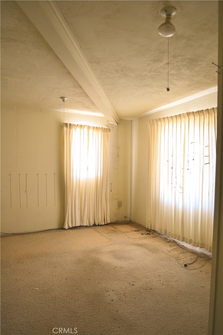 4040 Peter Rabbit Trail Twentynine Palms, CA 92277 - Photo 8 of 28 a view of an empty room with a window