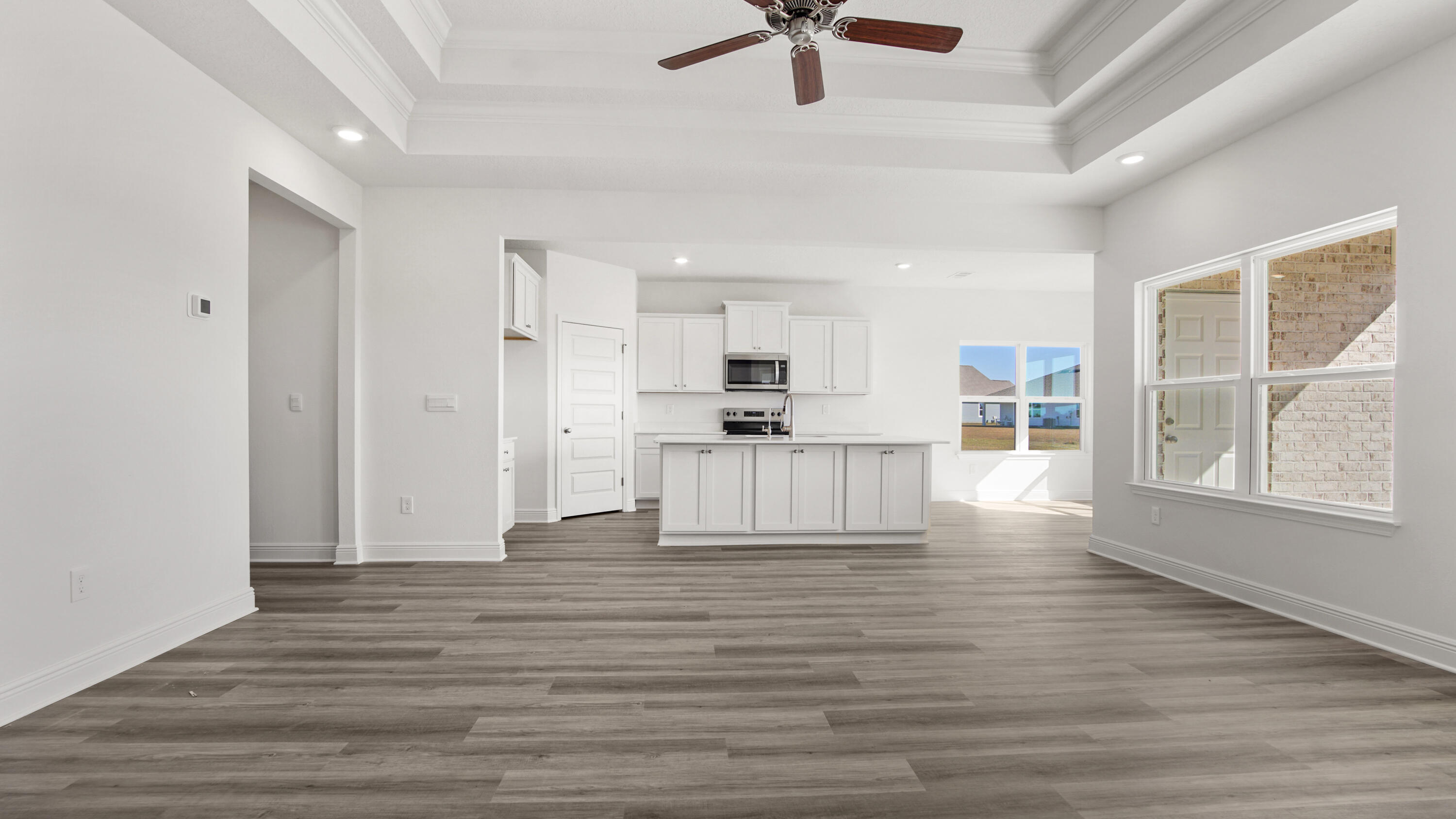 13 West W Farm Freeport, FL 32439 - Photo 18 of 38 a view of kitchen with wooden floor and window